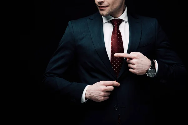 Teilansicht des Geschäftsmannes, der mit dem Finger auf schwarzes, menschliches Emotions- und Ausdruckskonzept zeigt — Stockfoto