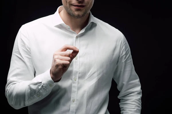 Cropped view of businessman gesturing with hand while using body language isolated on black, human emotion and expression concept — Stock Photo