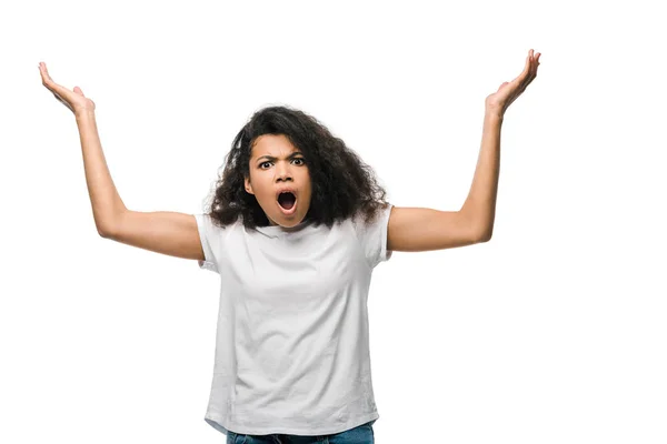 Surprised curly african american woman gesturing isolated on white — Stock Photo