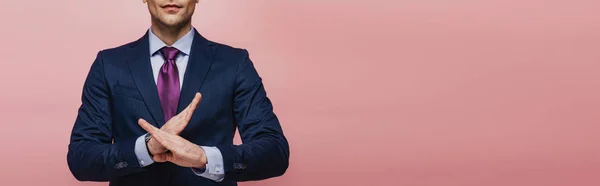 Cropped view of businessman showing refuse gesture isolated on pink, panoramic shot — Stock Photo