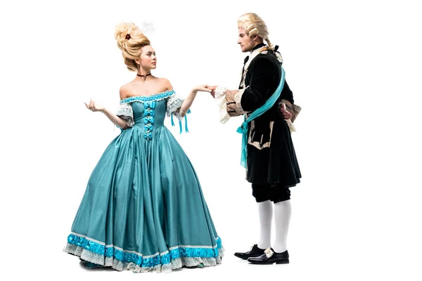 Schöner Herr an der Hand einer viktorianischen Frau in blauem Kleid, isoliert auf weißem Grund — Stockfoto