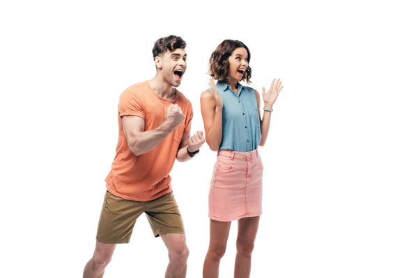 Excité homme et femme regardant loin et montrant des gestes oui isolé sur blanc — Photo de stock