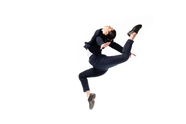 Graceful businesswoman in formal wear jumping in dance isolated on white — Stock Photo