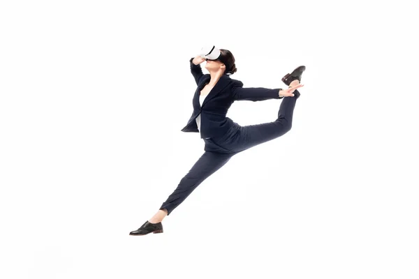 Young businesswoman dancing while using virtual reality headset isolated on white — Stock Photo