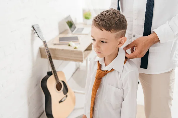 Partial view of father and son in white shirts with ties — Stock Photo