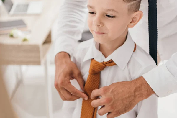 Partial view of father and son in white shirts with ties — Stock Photo