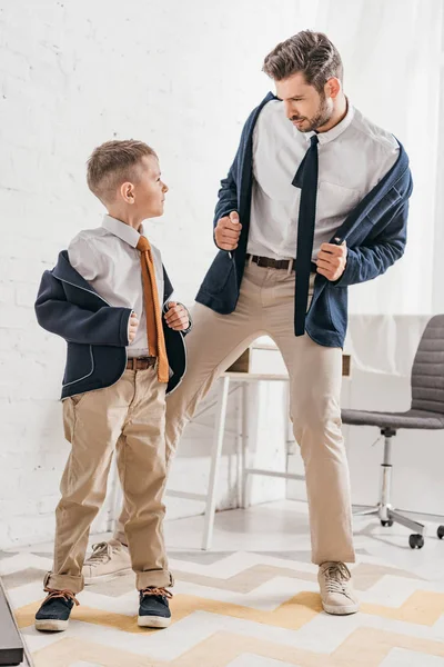 Full length view of father and dad in formal wear at home — Stock Photo