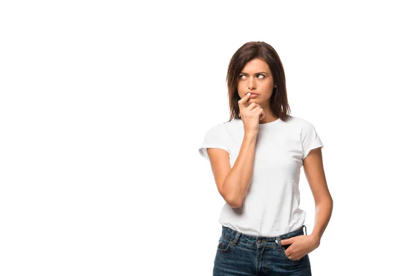 Attractive thoughtful woman in white t-shirt, isolated on white — Stock Photo