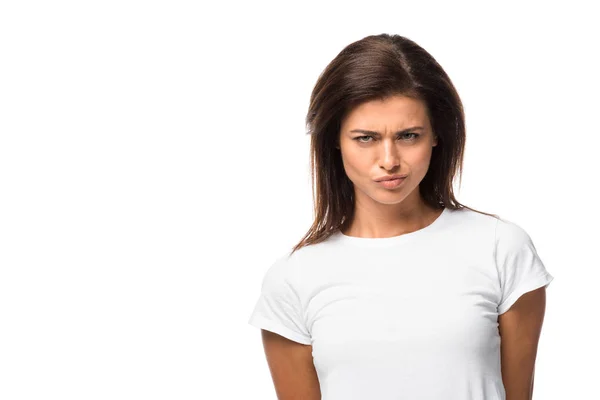 Thoughtful woman in white t-shirt looking at camera, isolated on white — Stock Photo