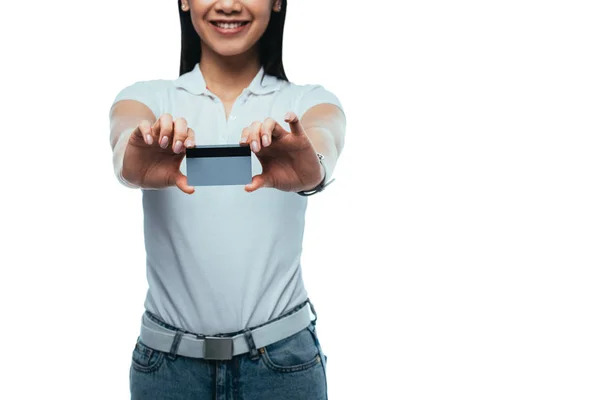 Recortado vista de sonriente atractivo asiático chica celebración de crédito aislado en blanco - foto de stock