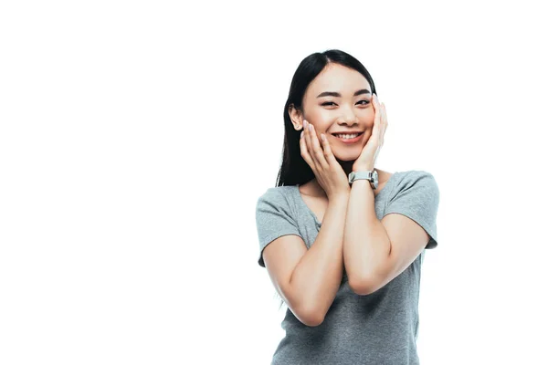 Feliz asiático chica tocando cara aislado en blanco - foto de stock