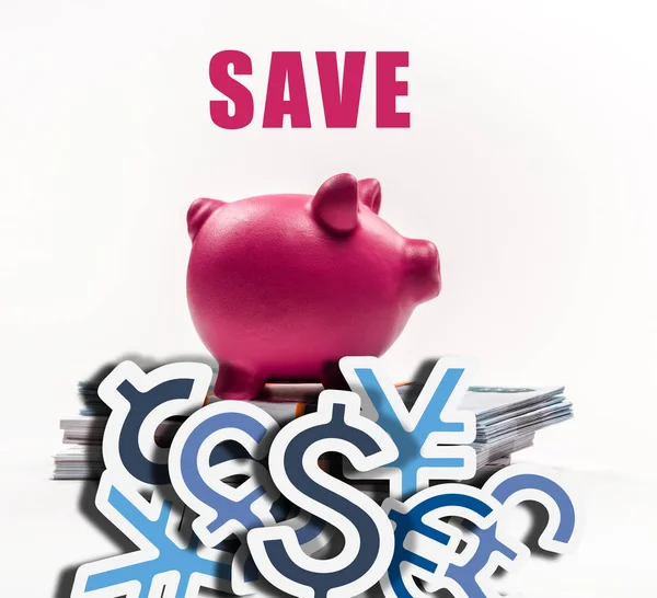Pink piggy bank on stack of russian rubles on white background with save money illustration — Stock Photo
