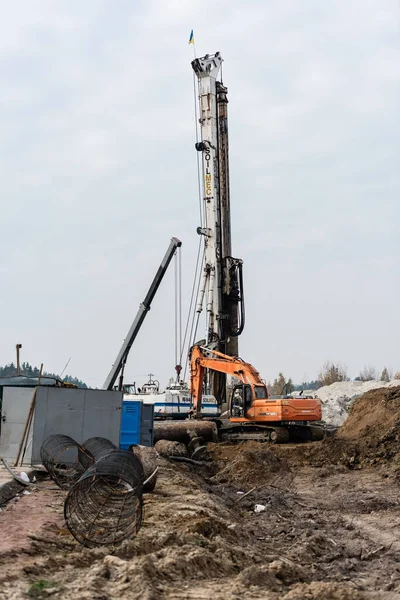 LVIV, UKRAINE - OCTOBER 23, 2019: modern truck with doosan and soilmec lettering against sky — Stock Photo