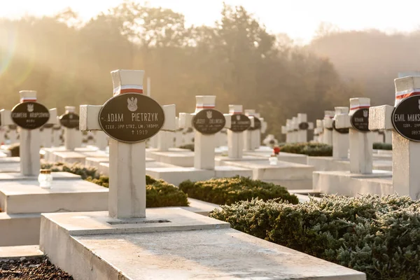 LVIV, UKRAINE - OCTOBER 23, 2019: selective focus of tombs with crosses and lettering in lychakiv cemetery in lviv — Stock Photo