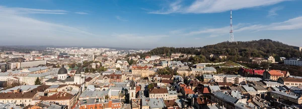 Website header of lviv cityscape with tv tower on castle hill and skyline — Stock Photo