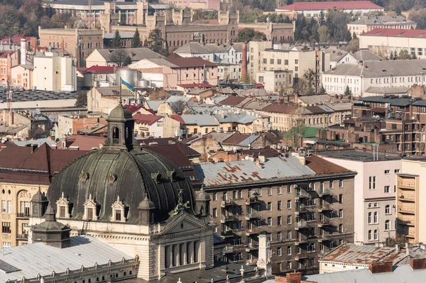 Aerial view of city with roof of dominican church and old buildings in historical center — Stock Photo