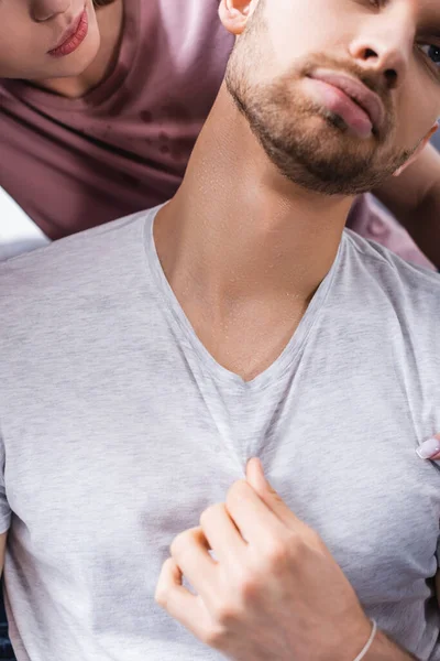 Cropped view of sad young couple suffering from summer heat at home — Stock Photo