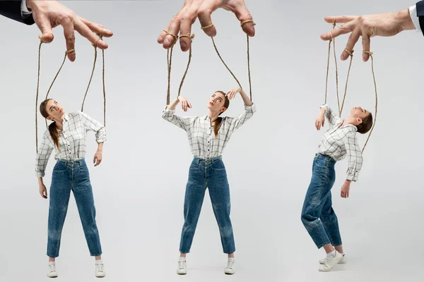 Vista recortada de titiritero sosteniendo marioneta en cuerdas aisladas en gris, collage - foto de stock