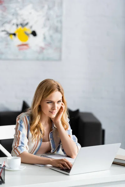 Selective focus of concentrated woman during working day — Stock Photo
