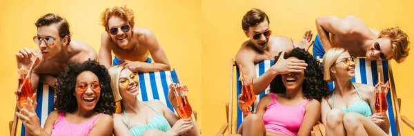 Collage of shirtless men having fun with multicultural women sitting in deck chairs with cocktails isolated on yellow, horizontal image — Stock Photo