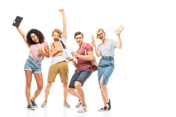 Multiethnic students with books gesturing on white background — Stock Photo