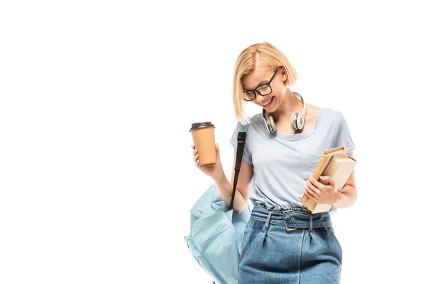 Estudiante con mochila, café para llevar y libros aislados en blanco - foto de stock