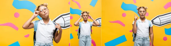 Collage of emotional schoolgirl in eyeglasses pointing with finger, touching eyeglasses and head near paper artwork elements on yellow — Stock Photo