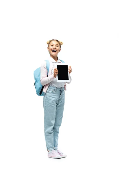 Estudante animado segurando tablet digital com tela em branco no fundo branco — Fotografia de Stock