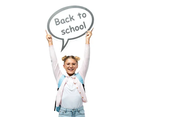 Estudante segurando bolha de fala com letras de volta para a escola no fundo branco — Fotografia de Stock