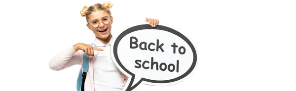 Website header of child pointing at speech bubble with back to school lettering isolated on white — Stock Photo