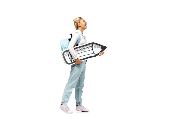 Child with backpack holding paper pencil on white background — Stock Photo