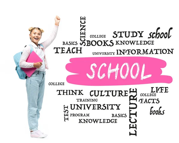 Schoolgirl with laptop and backpack showing yeah gesture near school lettering and illustration on white — Stock Photo