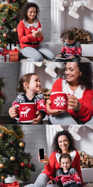 Colagem de mãe e filha segurando copos e usando gadgets perto da lareira — Fotografia de Stock