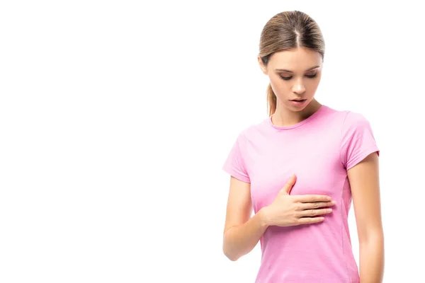 Mujer joven tocando mama aislada en blanco, concepto de cáncer de mama - foto de stock