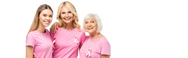 Заголовок сайту жінок зі стрічками поінформованості про рак молочної залози, що обіймаються ізольовано на білому — стокове фото