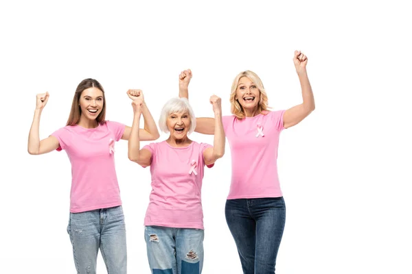 Aufgeregte Frauen zeigen Yah-Geste in die Kamera, während sie Schleifen des Brustkrebsbewusstseins auf Weiß tragen — Stockfoto