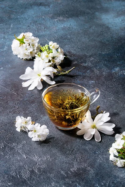 Glass Cup Hot Green Tea Spring Flowers White Magnolia Cherry — Stock Photo, Image