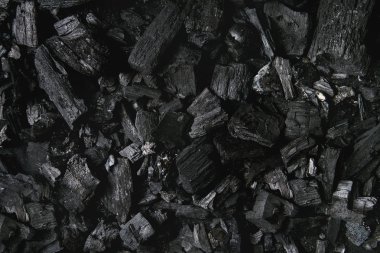 Siyah kömür dokusu soyut yüzey arkaplanı. Üst görünüm