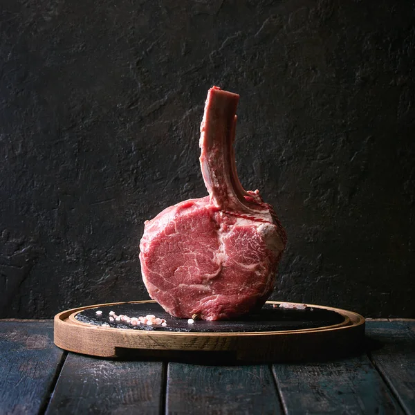 Raw Uncooked Black Angus Beef Tomahawk Steak Bone Served Salt — Stock Photo, Image