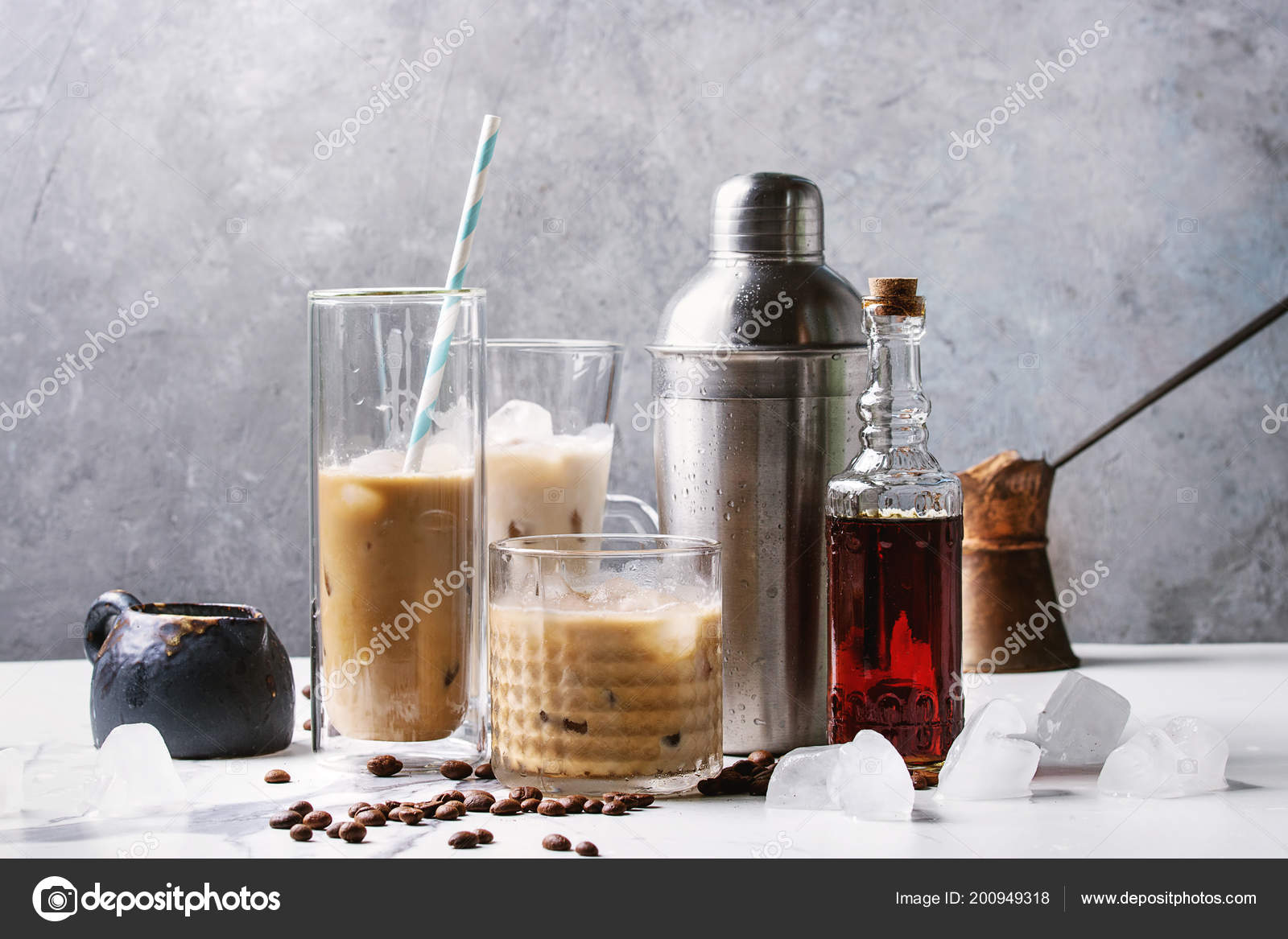 Iced Coffee Cocktail Or Frappe With Ice Cubes And Cream In
