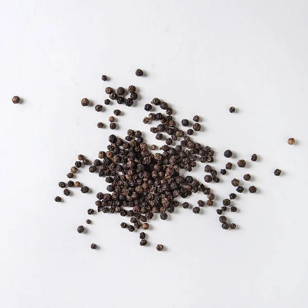 Heap Black Pepper Peppercorns White Background Top View Space Square — Stock Photo, Image
