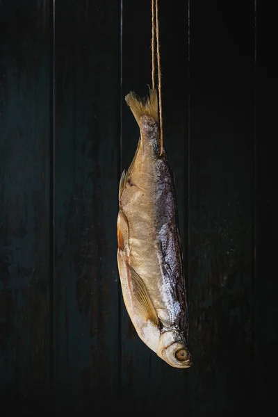 Dried Fish Stockfish Thread Dark Wooden Background — Stock Photo, Image