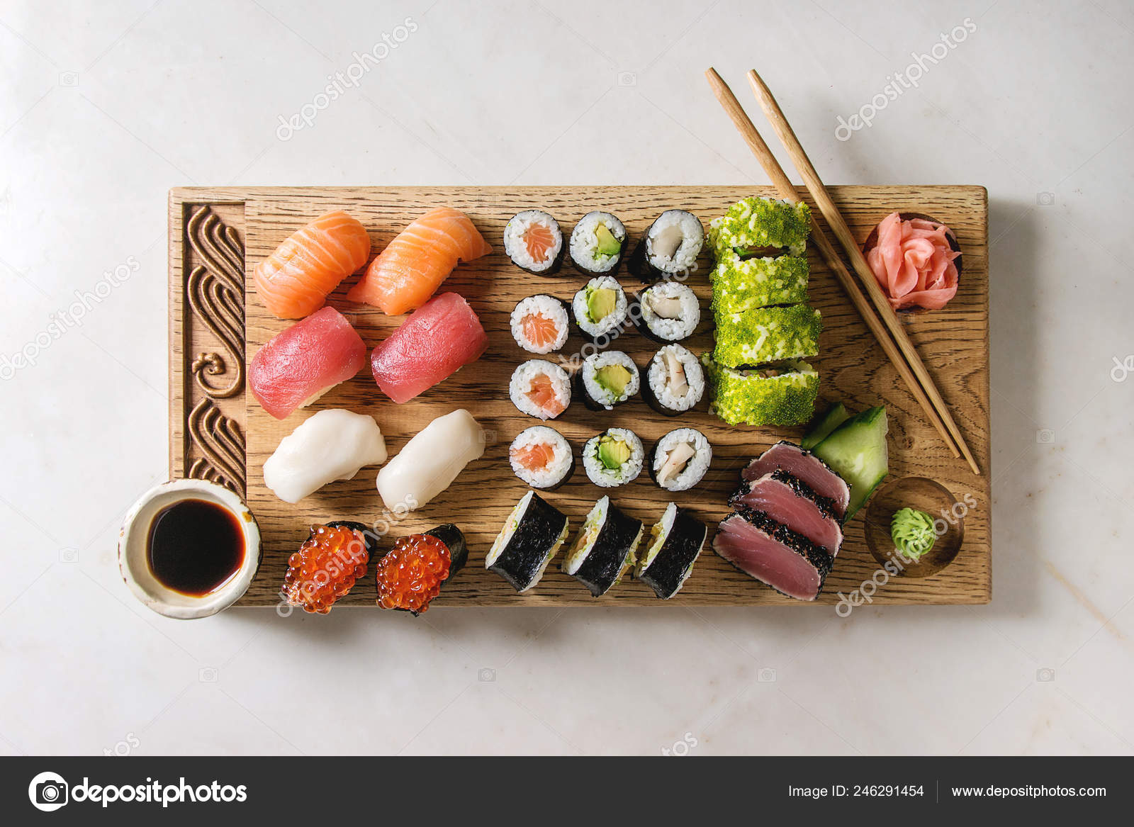 Sushi Set Nigiri Sushi Rolls Wooden Serving Board Soy Sauce Stock Photo by  ©NatashaBreen 246291454