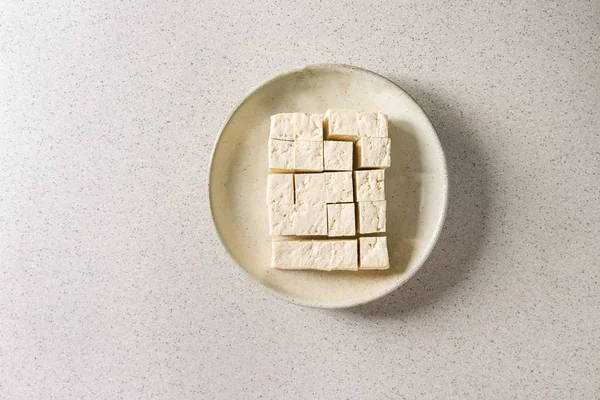 Cutting tofu cheese — Stock Photo, Image