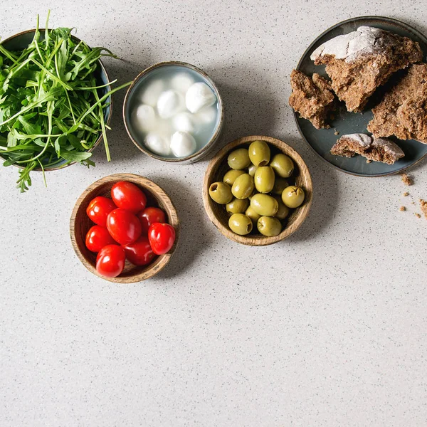 Mozzarella tomatoes olives antipasto — Stock Photo, Image