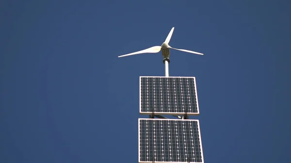 Solar panel and wind turbine on the sky background — Stock Photo, Image