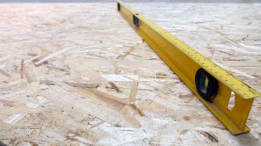 İnşaat araçları sarı. Kabarcık seviyesi. İş kavramı.