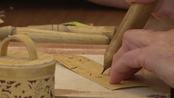 Birch bark carving.Production of products from birch bark close-up — Stock Video