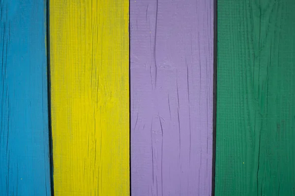 Kurulun arka plan rengi.Her farklı renkte tahtaile parlak ahşap çit. — Stok fotoğraf