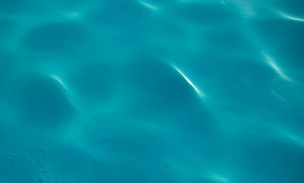 青い水。水色の水の背景 — ストック写真